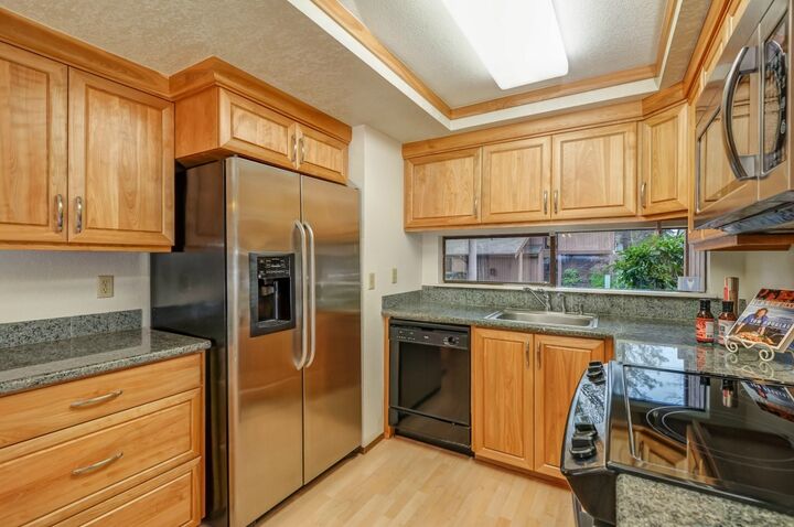 Property Photo:  4115  145th Avenue NE F1  WA 98007 