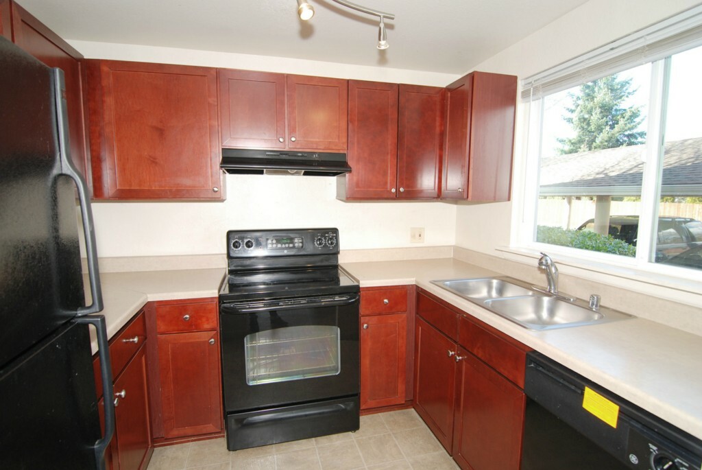 Property Photo:  23712 13th Place S 1006  WA 98198 