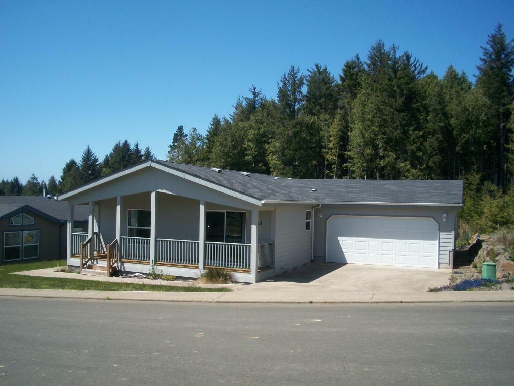 Property Photo:  115 SE Whalesong Drive  OR 97341 