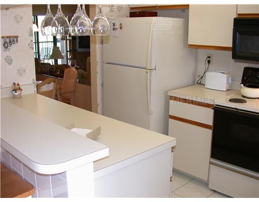 Property Photo: 933 Capri Isles Boulevard 38 FL 34292
