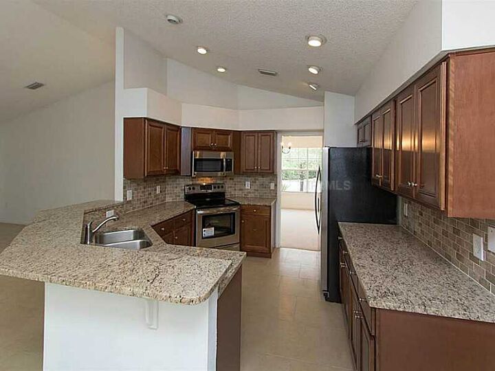 Property Photo:  107 Olympus Drive  FL 34761 