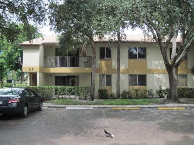 Property Photo:  117 Gardens Drive 201  FL 33069 