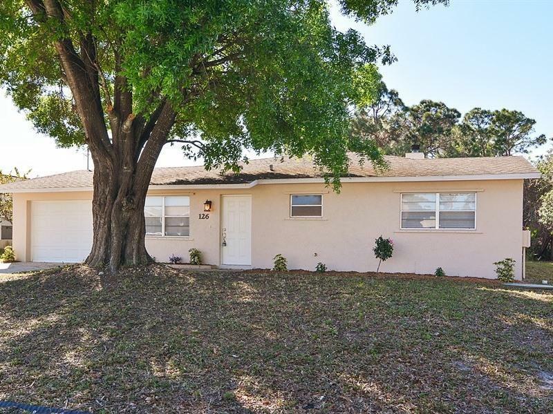 Property Photo:  126 NW Peach  FL 34953 