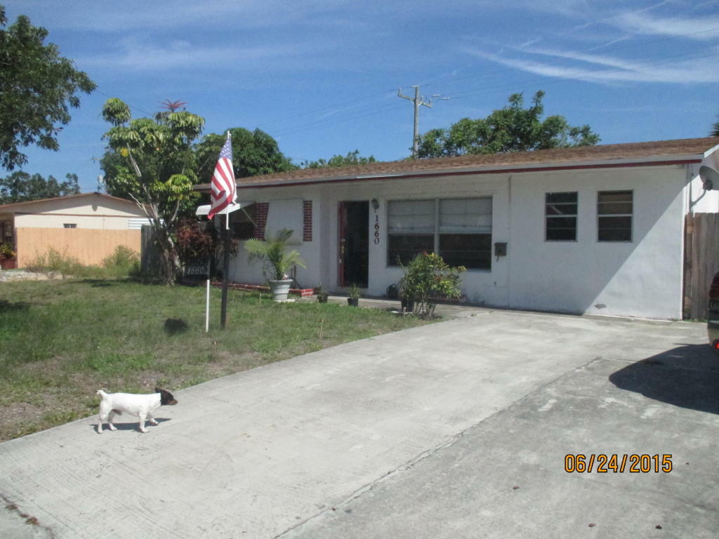 Property Photo:  1660 NE 33 Street  FL 33064 