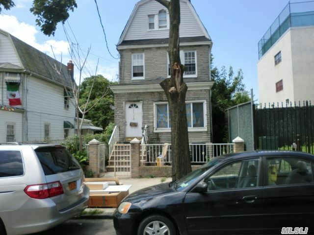 Property Photo: 33-12 112th Street NY 11368