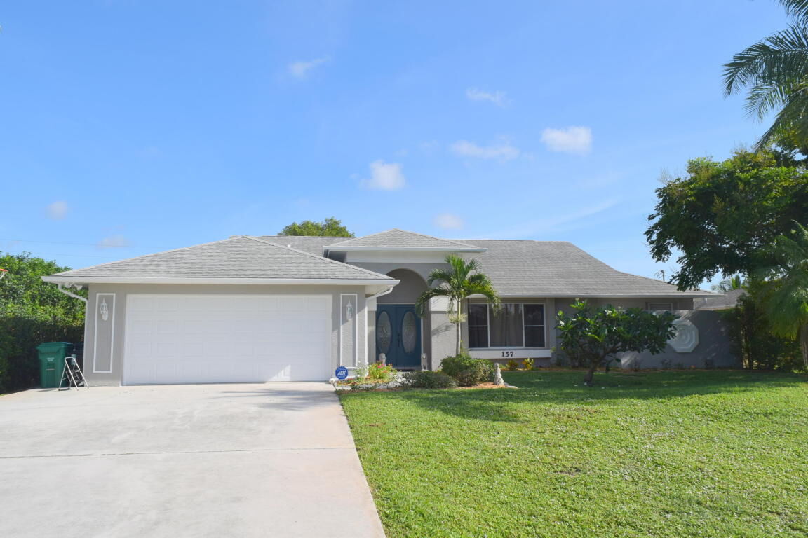Property Photo: 157 SW Oakridge Drive FL 34984
