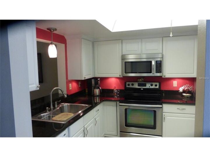 Property Photo:  1100 Capri Isles Boulevard 113  FL 34292 