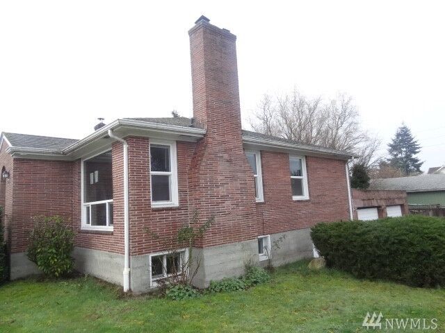 Property Photo:  906 N Cheyenne St  WA 98406 