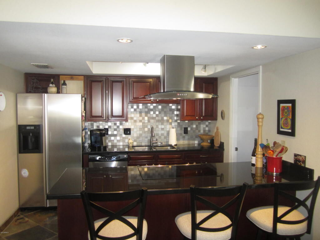 Property Photo:  8720 E Olive Avenue  AZ 85251 