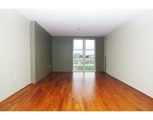Property Photo: 113 Sumner St 65 MA 02128