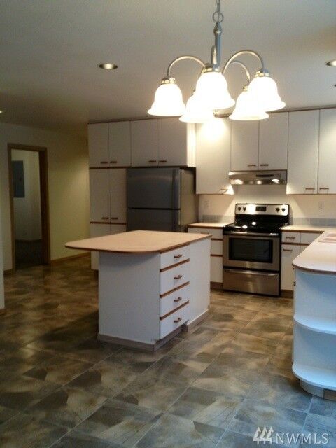 Property Photo:  9067 NE Hidden Cove Rd  WA 98110 