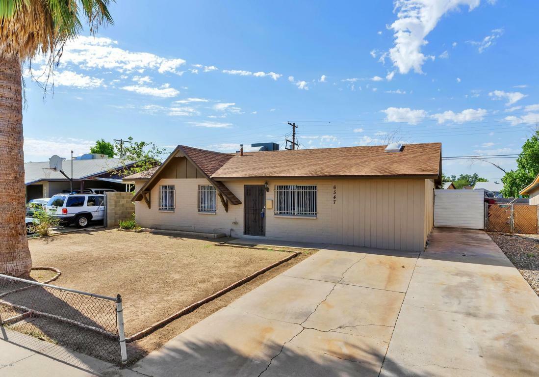 Property Photo:  6547 W Rose Lane  AZ 85301 