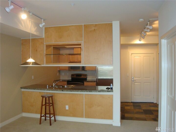 Property Photo:  300 110th Ave NE 311  WA 98004 