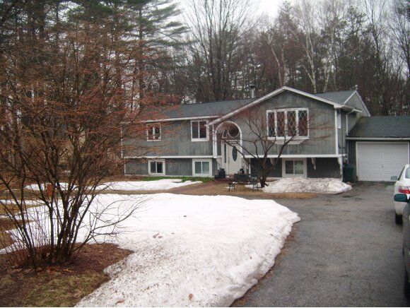 Property Photo:  19 Four Seasons  NH 03054 