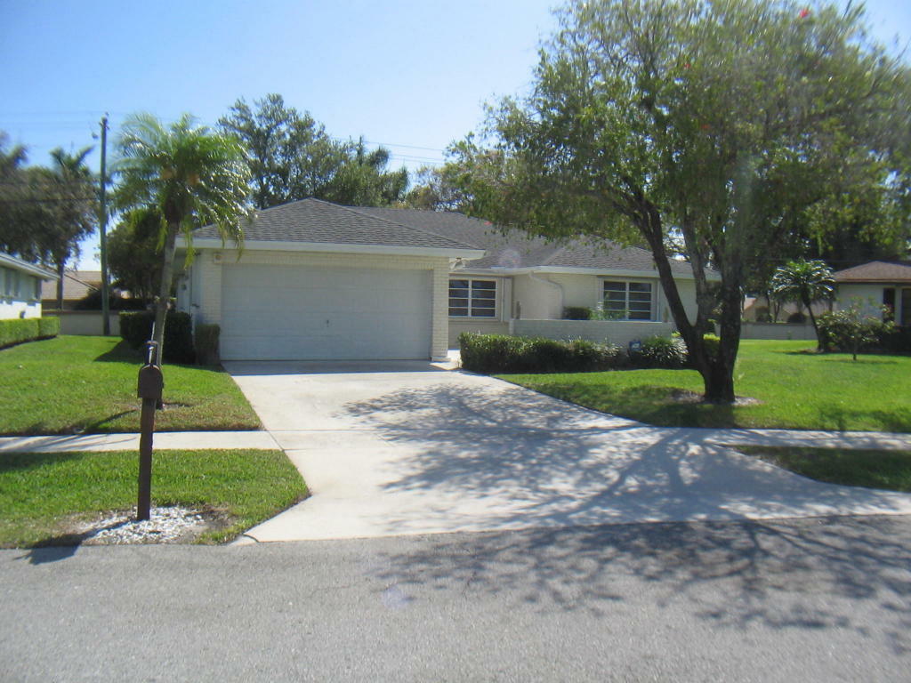 Property Photo:  10700 Greentrail Drive S  FL 33436 