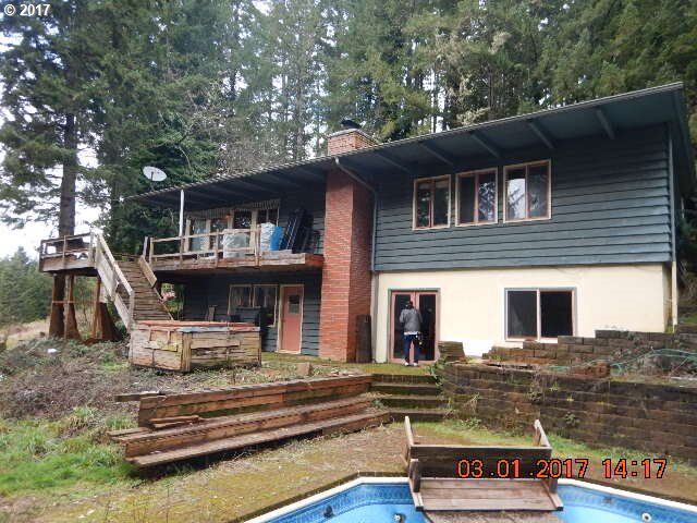 Property Photo: 89831 Poodle Creek Rd OR 97461