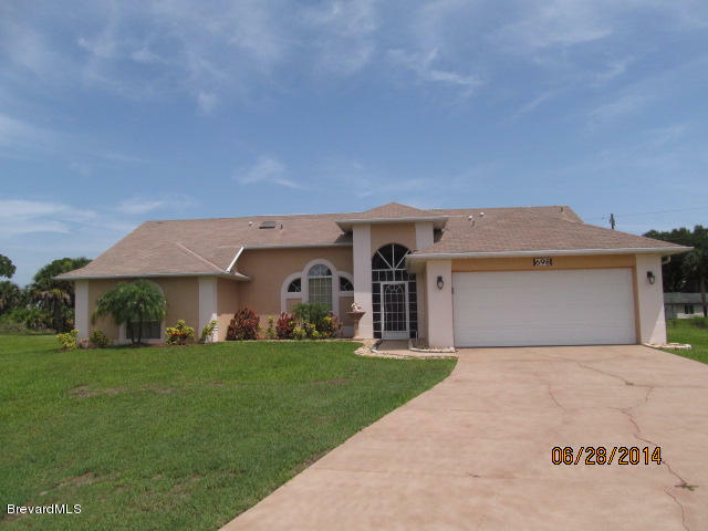 Property Photo:  698 SE Sauders Road  FL 32909 