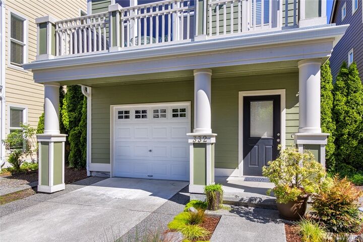 Property Photo:  332 Wyatt Wy NE 14  WA 98110 