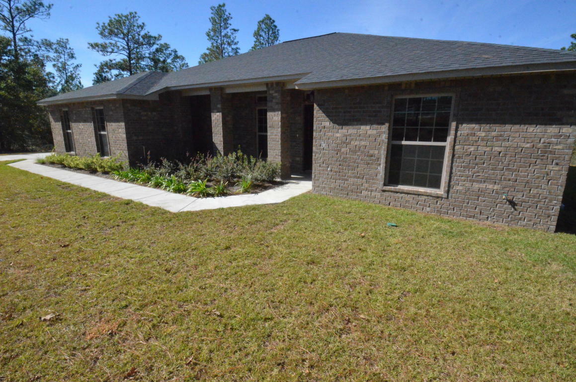 Property Photo:  6513 Welannee Boulevard  FL 32567 