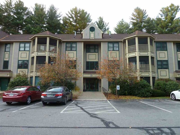 Property Photo:  7 Bartemus Trail 206  NH 03063 
