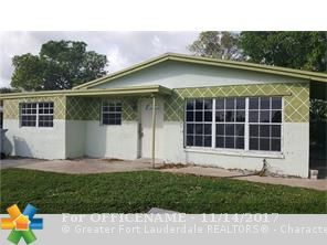 Property Photo:  701 NW 20th St  FL 33060 