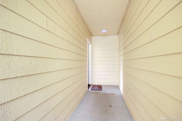 Property Photo: 1111 S Villard Street B7 WA 98465