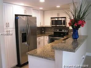 Property Photo:  9001 SW 77th Ave C204  FL 33156 