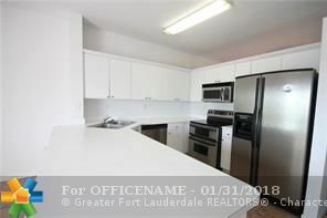 Property Photo:  6930 NW 179th St 301-8  FL 33015 