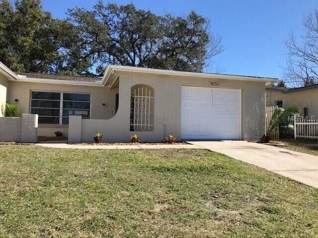 Property Photo: 9034 Richwood Lane FL 34668