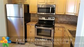 Property Photo:  2705 S Oakland Forest Dr 204  FL 33309 