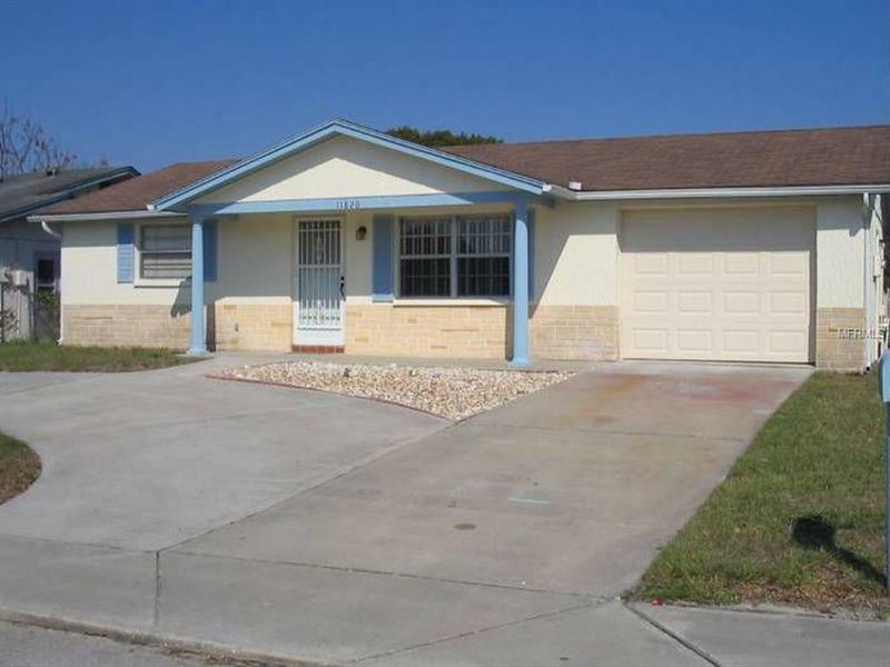 Property Photo:  11820 Oceanside Drive  FL 34668 