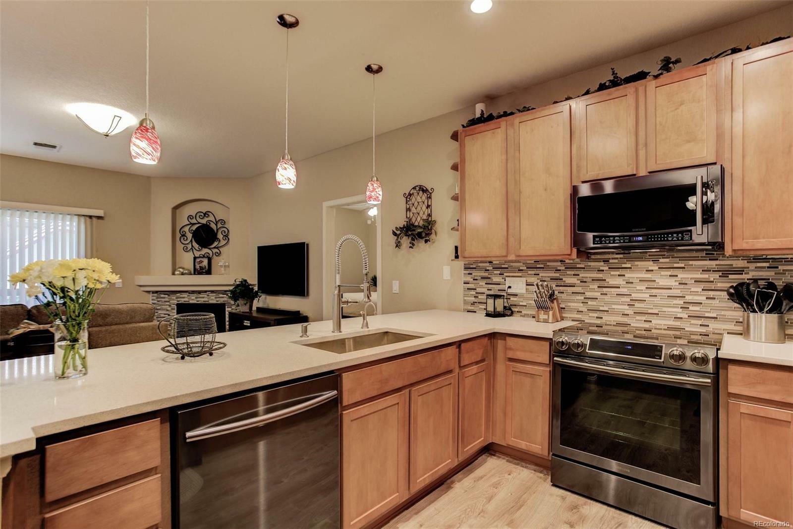 Property Photo: 23376 East 5th Place Unit 102 CO 80018