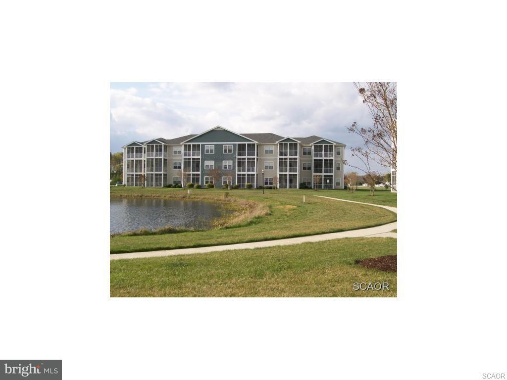 Property Photo:  33156 N Village Loop 4-102  DE 19958 