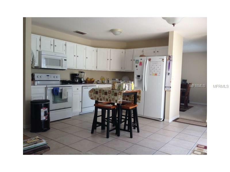 Property Photo:  7765 Indian Ridge Trail N  FL 34747 