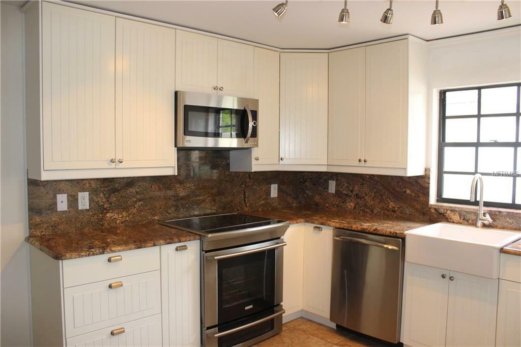 Property Photo:  18714 Wimbledon Circle 18714  FL 33558 
