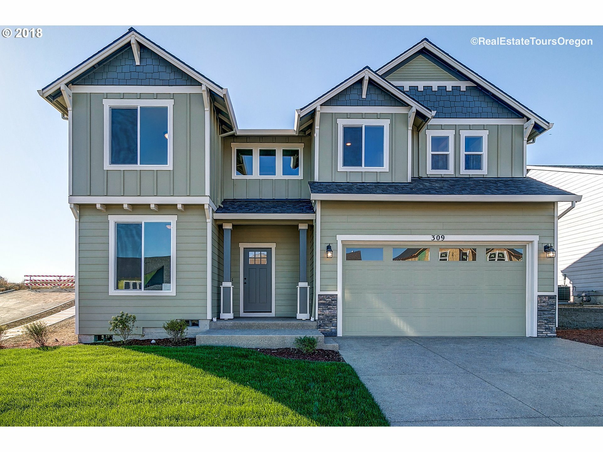 Property Photo:  309 NW Valleys Edge St  OR 97128 