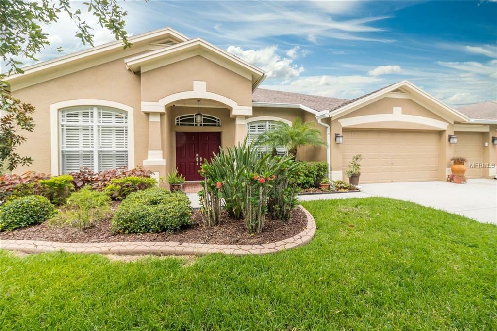 Property Photo: 7314 Carrington Oaks Lane FL 33572