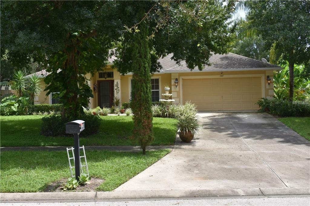 Property Photo:  1317 Canopy Oaks Drive  FL 34715 