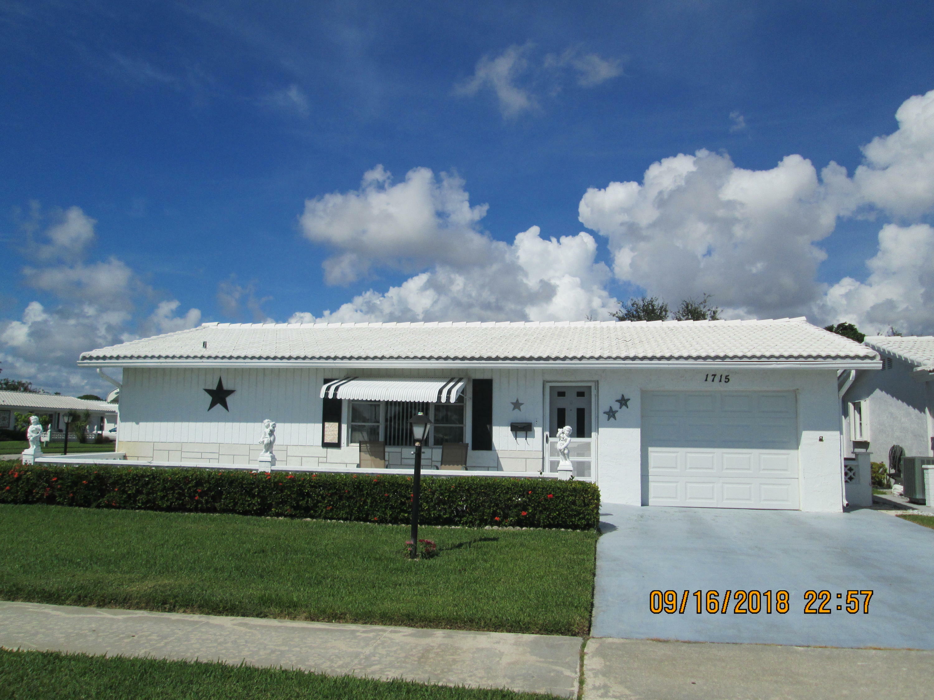 Property Photo: 1715 SW 22nd Street FL 33426