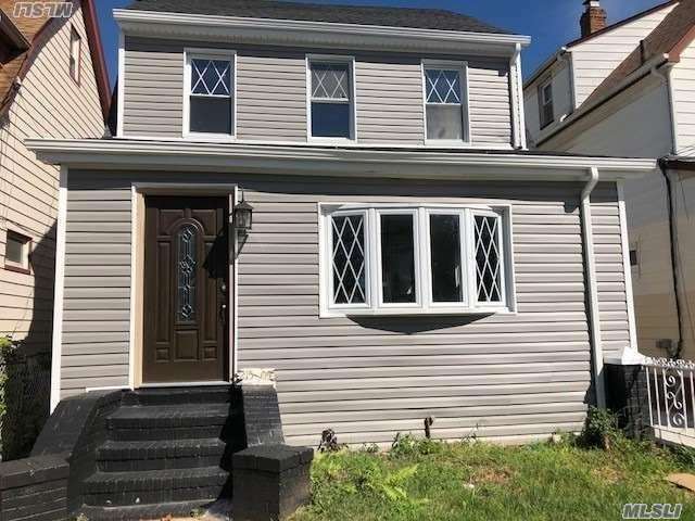 Property Photo: 215-05 111th Road NY 11429
