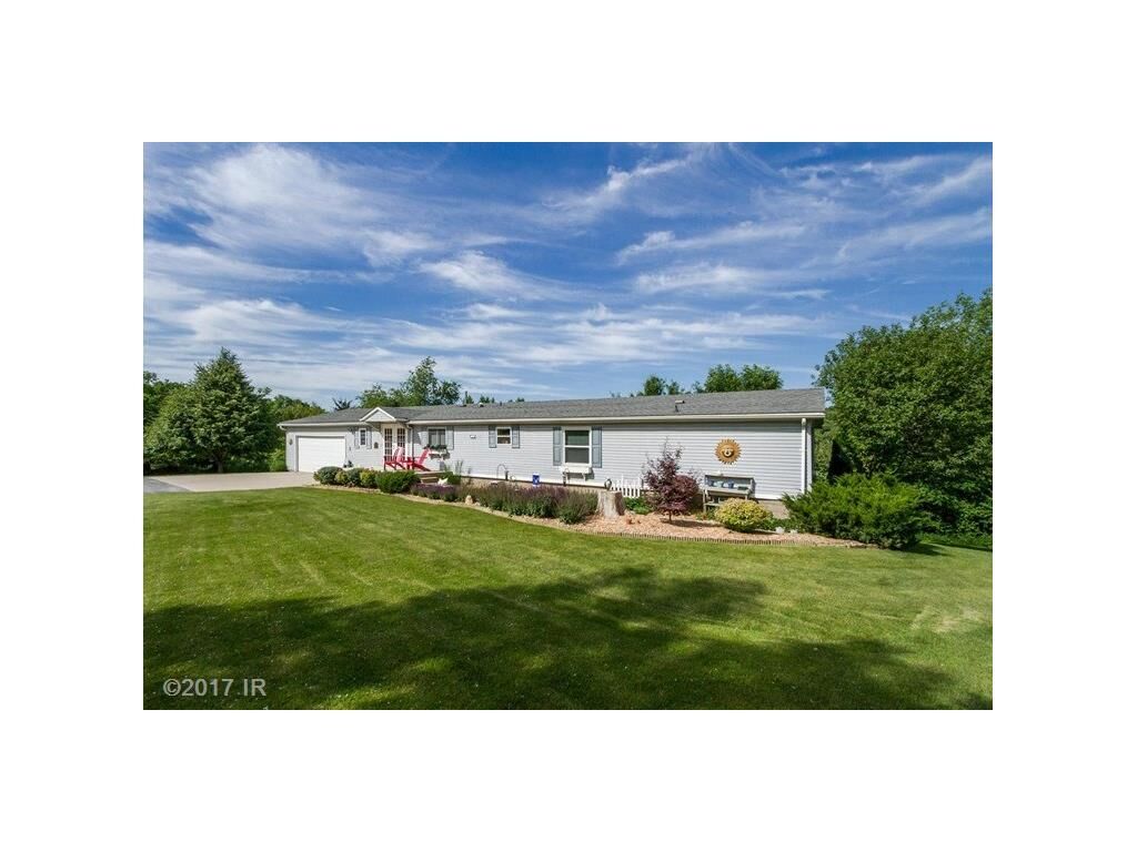 Property Photo:  8668 143rd Avenue  IA 50125 