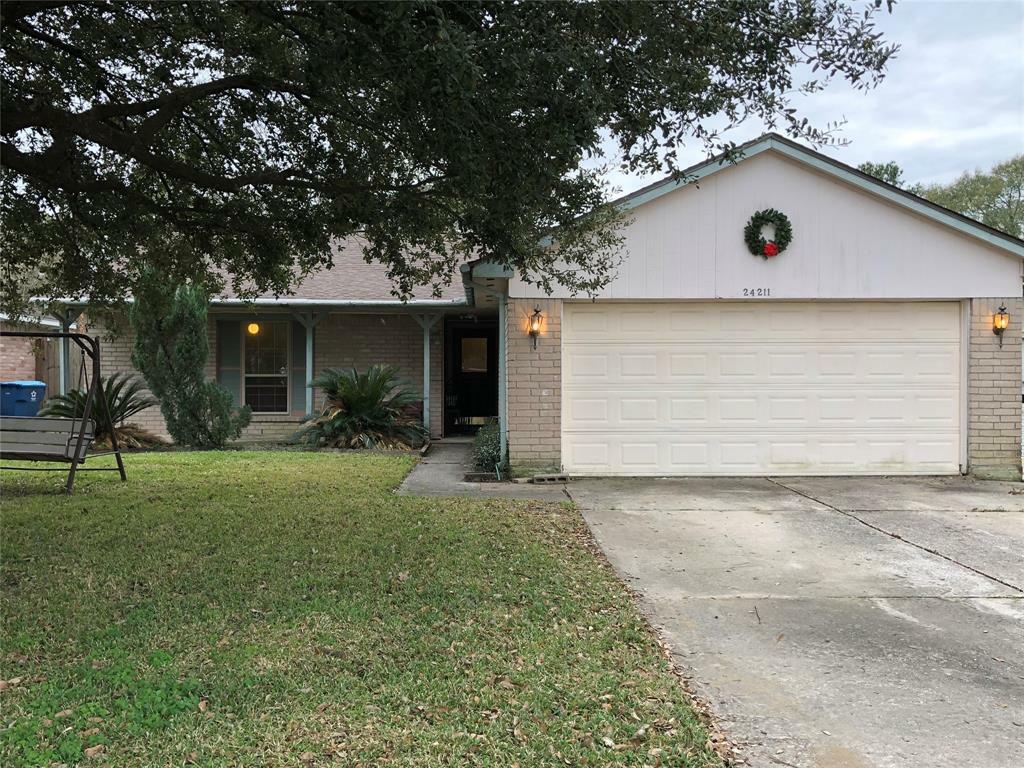 Property Photo: 24211 Lone Elm Dr TX 77373