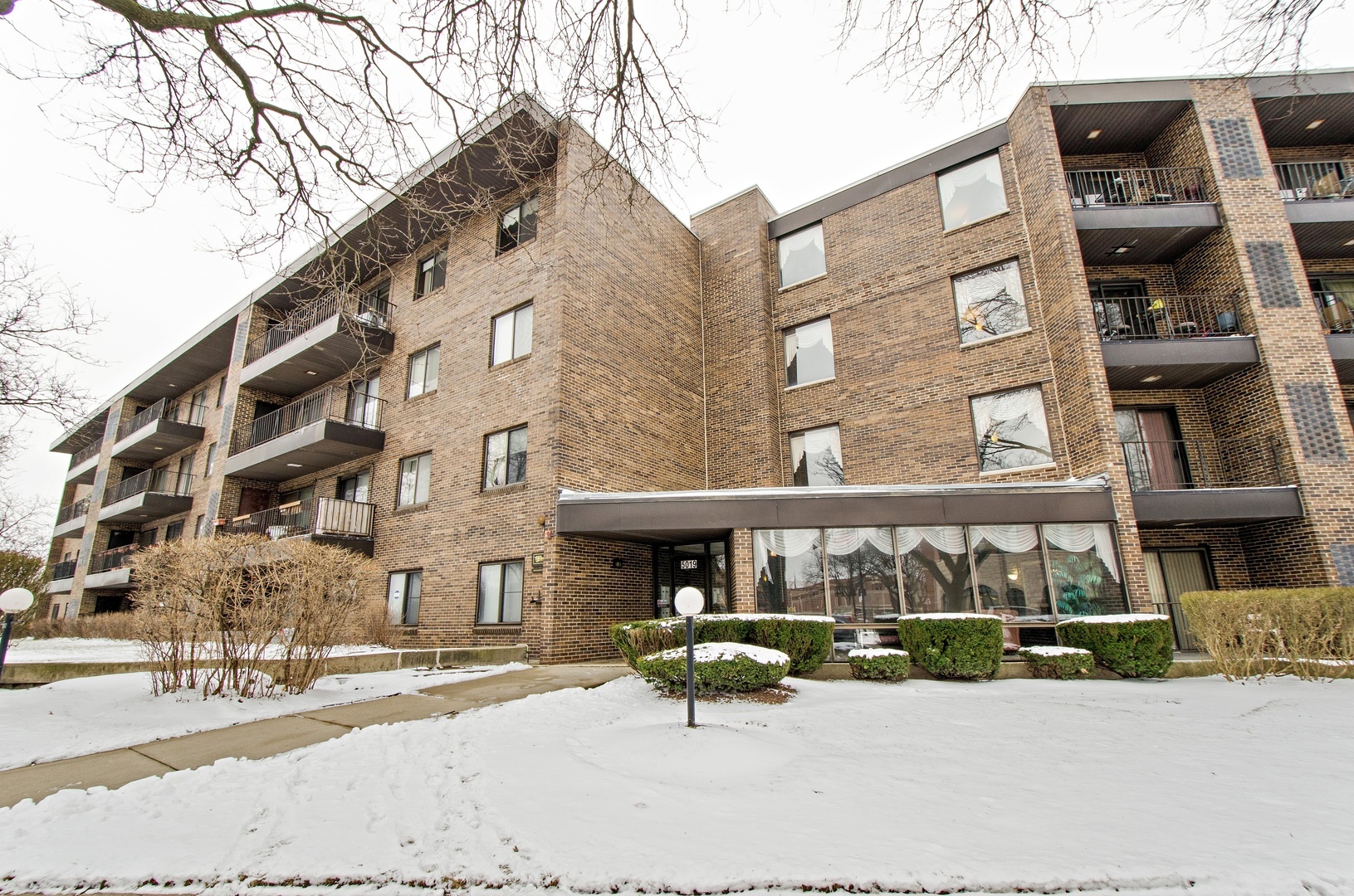 Property Photo: 5019 Mulford Street 404 IL 60077