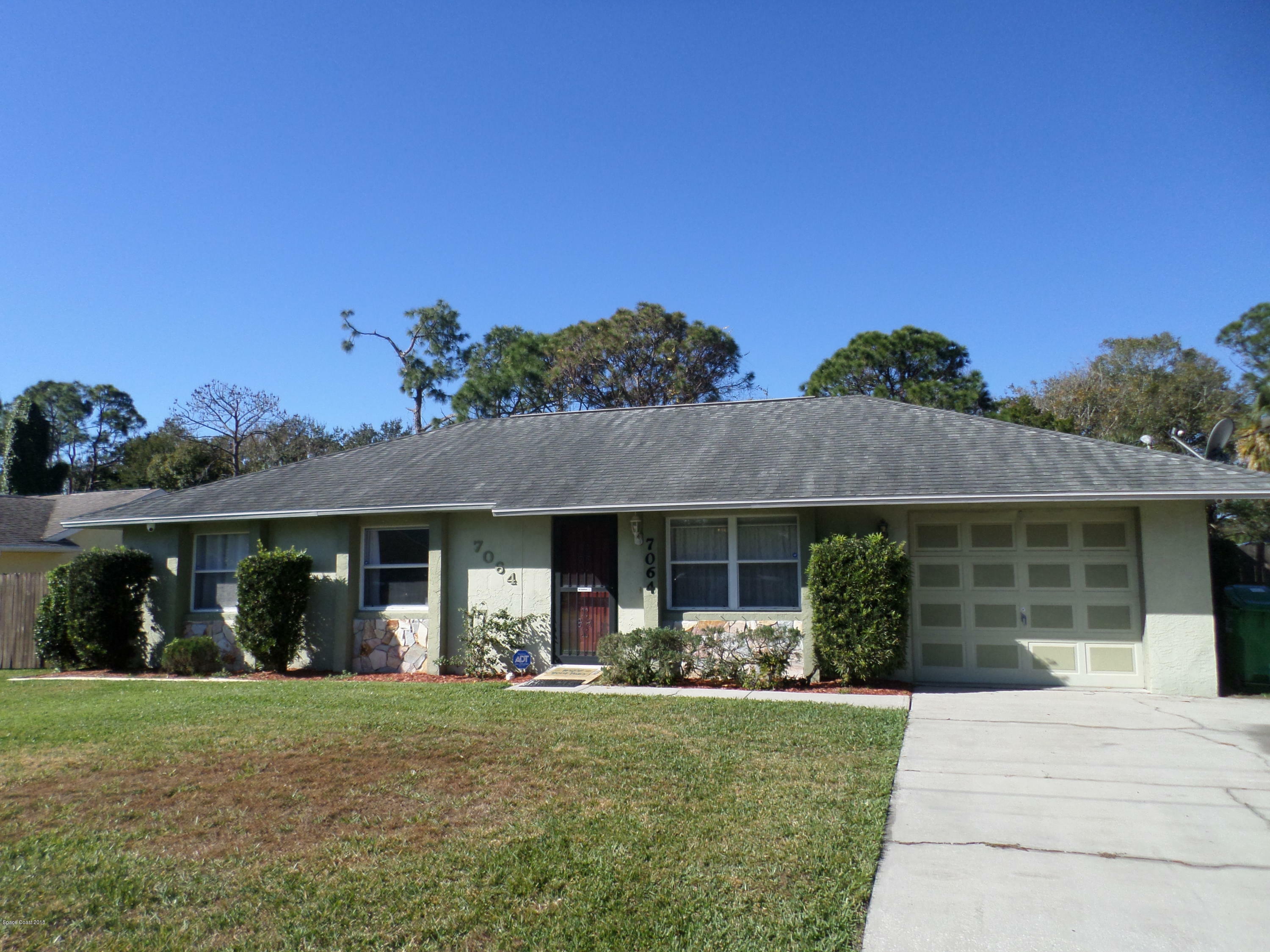 Property Photo:  7064 Holly Avenue  FL 32927 