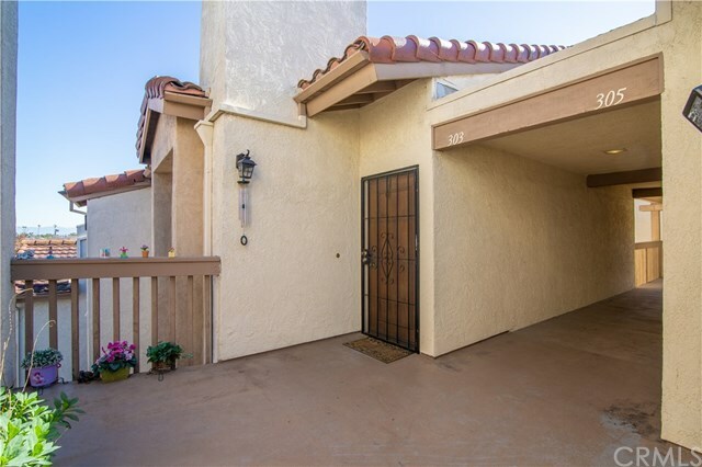 Property Photo:  16581 Grunion 303  CA 92649 