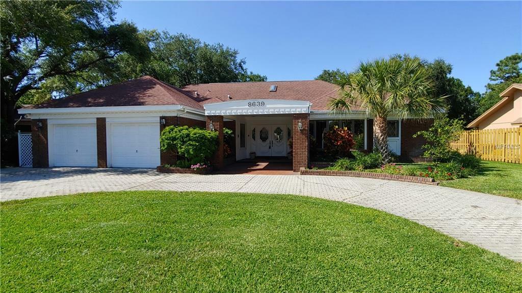 Property Photo:  8639 Maidstone Court  FL 33777 