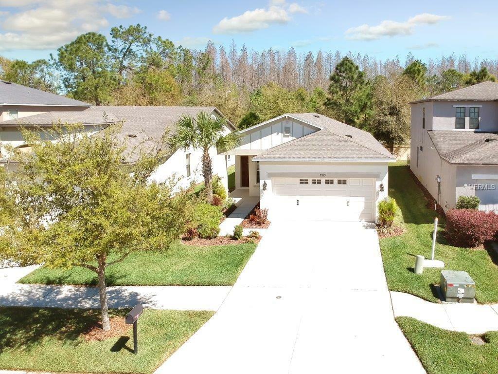 Property Photo:  7829 Tuscany Woods Drive  FL 33647 