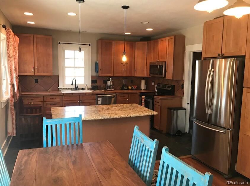 Property Photo: 3167 South Acoma Street CO 80110
