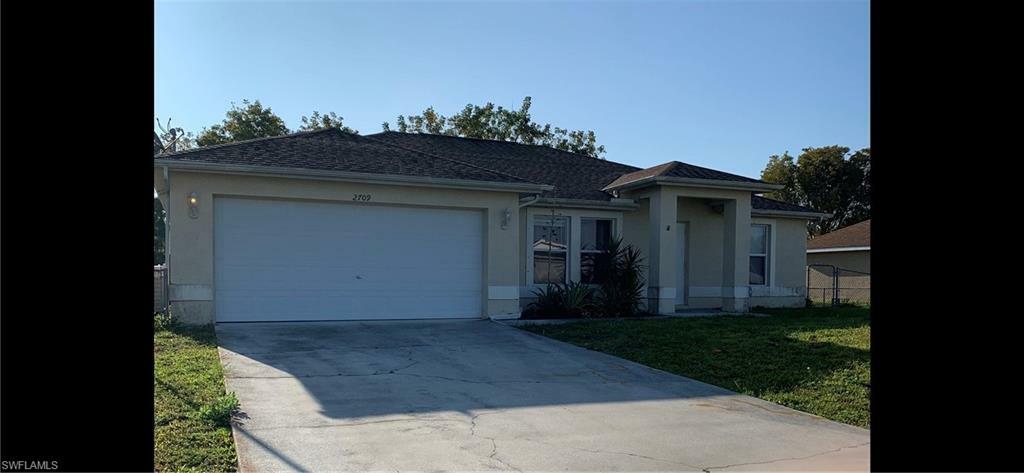 Property Photo:  2709 NW 2nd Avenue  FL 33993 