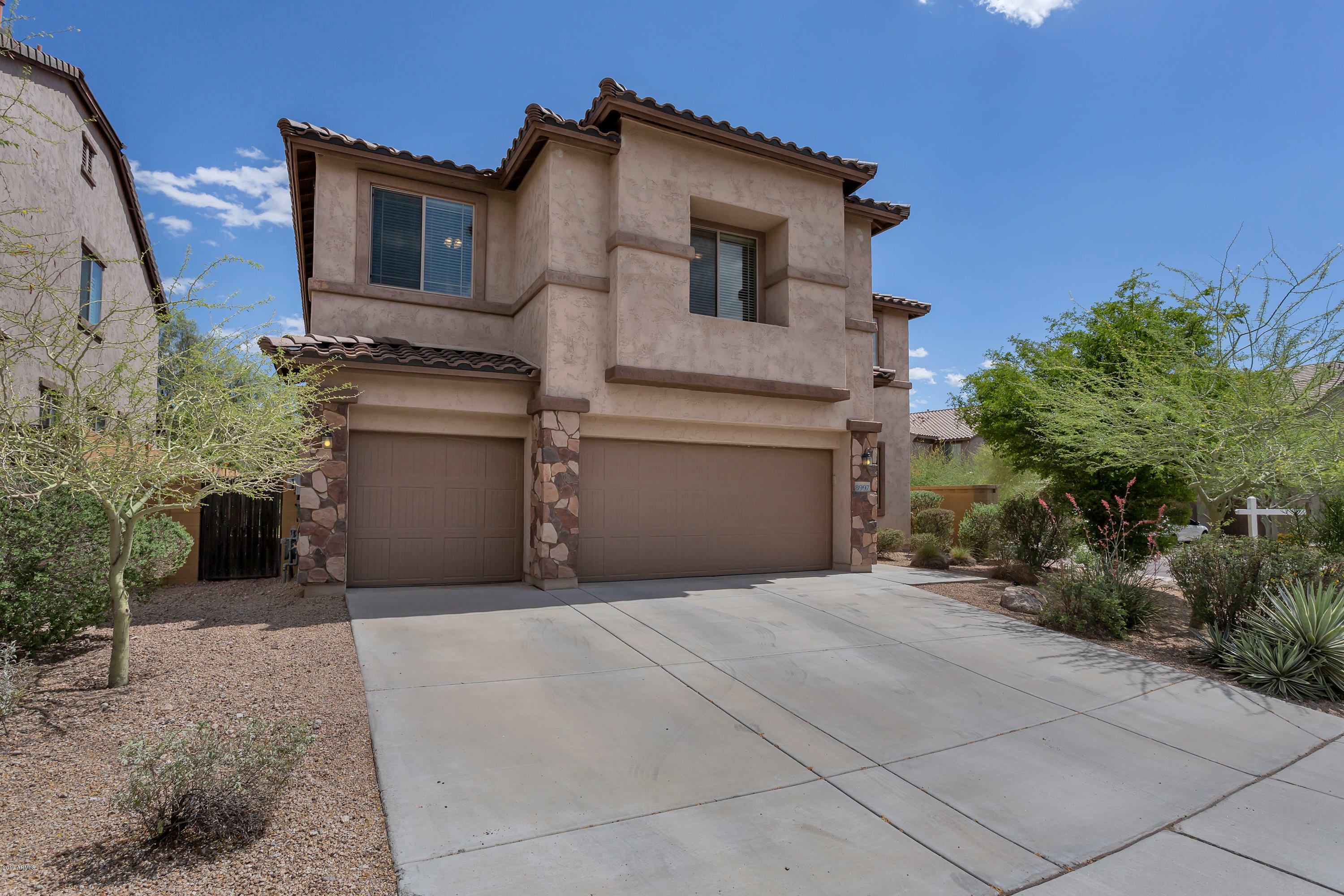 Property Photo:  8997 W Plum Road  AZ 85383 